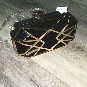 New Urban Treasures black and gold hard shell purse with gold chain